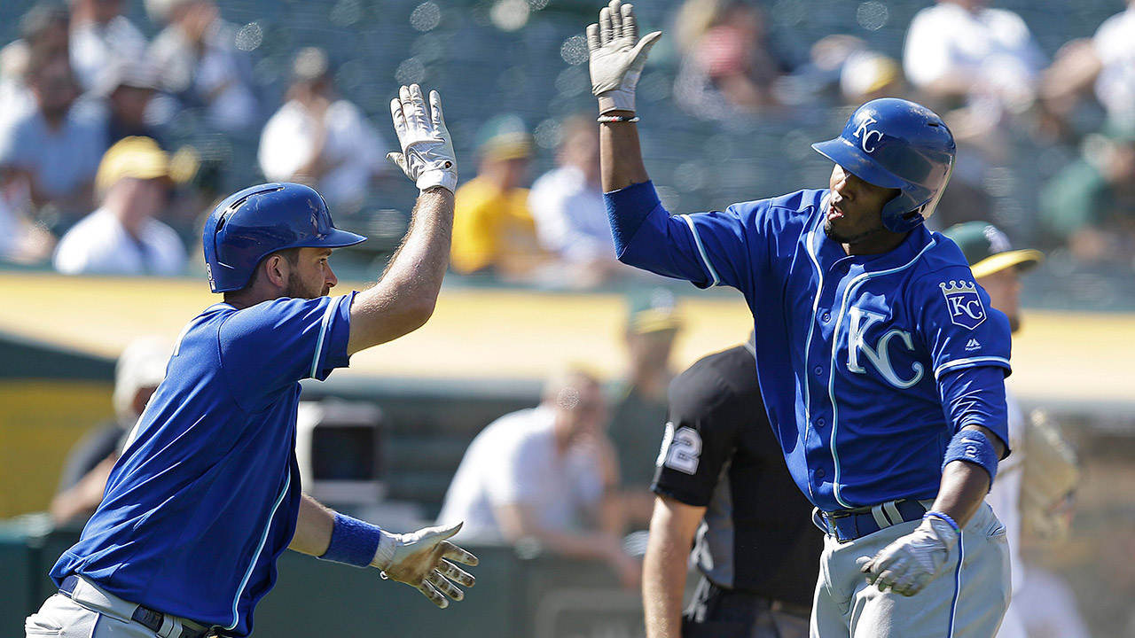 Kansas-City-Royals'-Alcides-Escobar,-right,-celebrates-with-Drew-Butera.-(Ben-Margot/AP)
