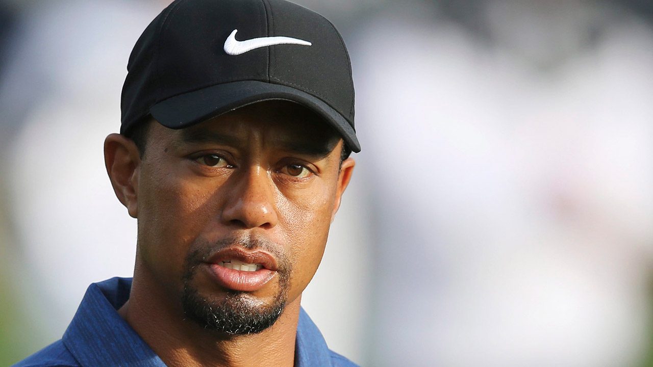 Tiger-Woods-reacts-on-the-10th-hole-during-the-first-round-of-the-Dubai-Desert-Classic.-(Kamran-Jebreili/AP)