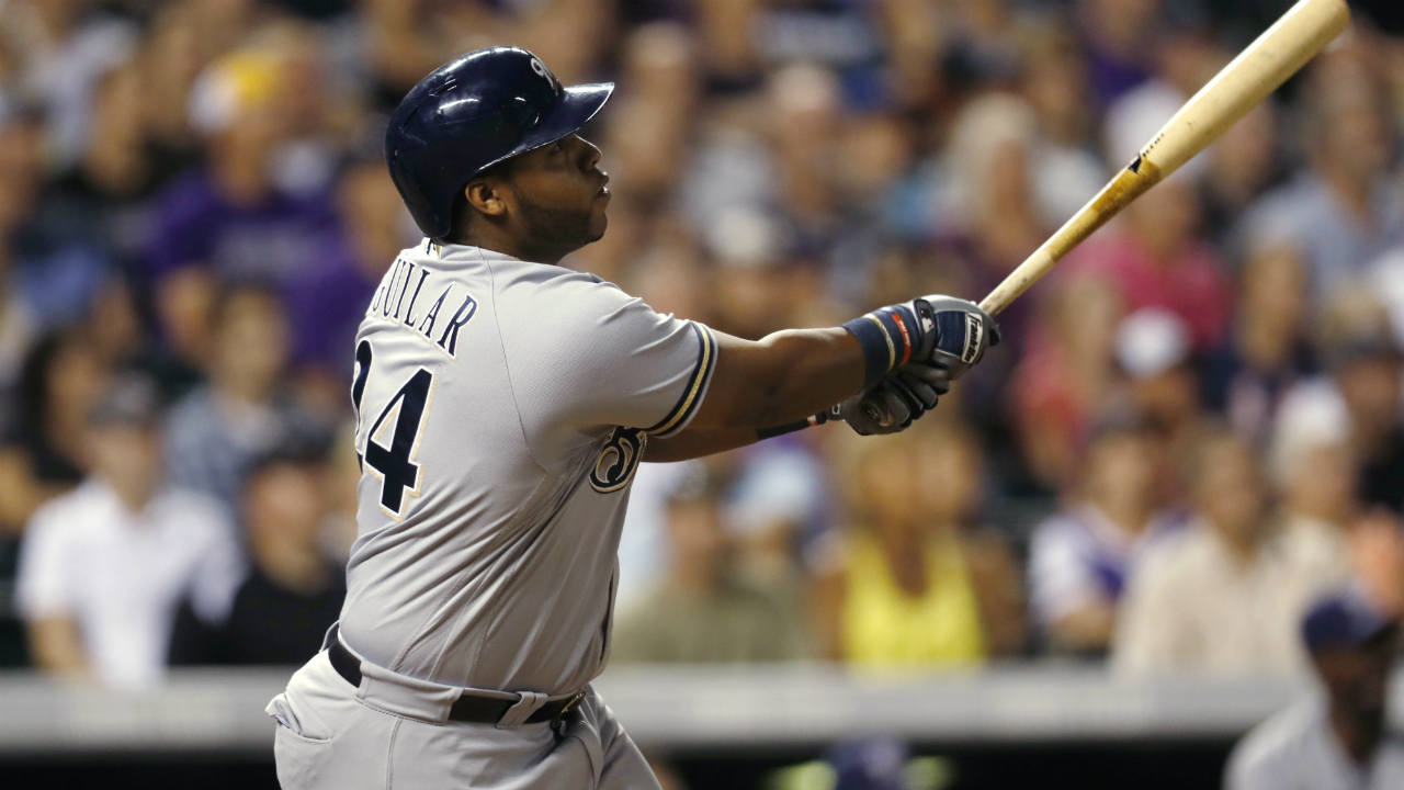 Milwaukee-Brewers-pinch-hitter-Jesus-Aguilar-watches-his-two-run-home-run-off-Colorado-Rockies-relief-pitcher-Greg-Holland-during-the-ninth-inning-of-a-baseball-game-Saturday,-Aug.-19,-2017,-in-Denver.-The-Brewers-won-6-3.-(David-Zalubowski/AP)