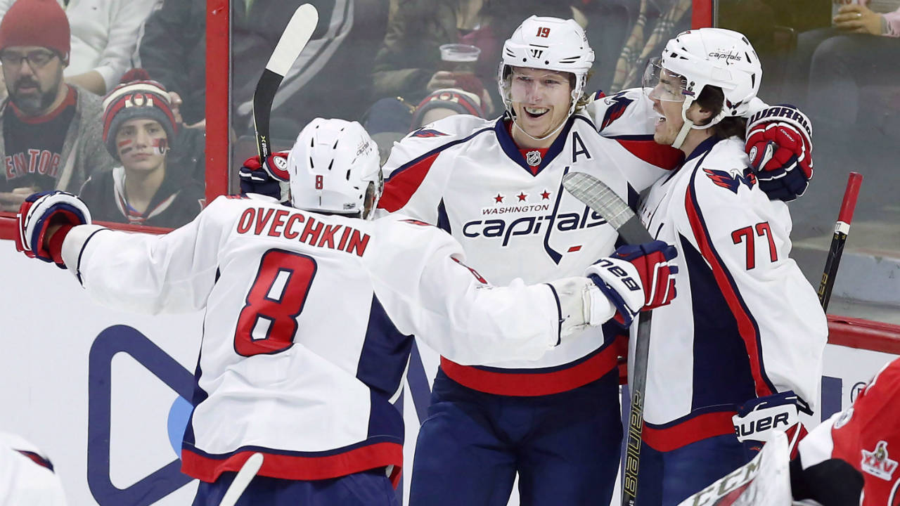 Washington-Capitals'-T.J.-Oshie-(77)-celebrates-his-goal-with-teammates-Nicklas-Backstrom-(19)-and-Alex-Ovechkin-(8)-during-first-period-NHL-hockey-against-the-Ottawa-Senators,-in-Ottawa-on-Saturday,-January-7,-2017.-(Fred-Chartrand/CP)