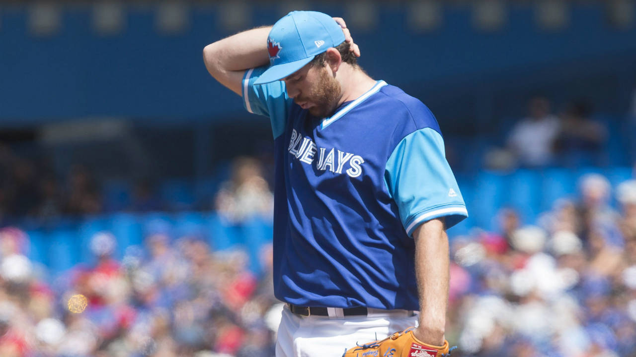 Toronto-Blue-Jays-starting-pitcher-Joe-Biagini-reacts-during-second-inning-American-League-baseball-action-against-Minnesota-Twins-in-Toronto-on-Sunday,-August-27,-2017.-(Chris-Young/CP)
