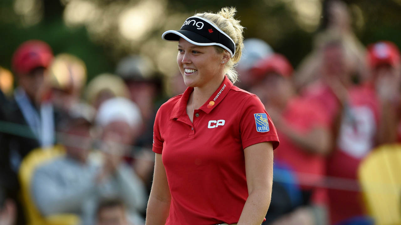 Brooke-Henderson-smiles-as-she-finishes-the-second-round-of-the-Canadian-Pacific-Women's-Open-in-Ottawa-on-Friday,-Aug.-25,-2017.-(Sean-Kilpatrick/CP)