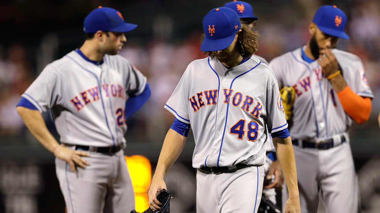 New-York-Mets-starting-pitcher-Jacob-deGrom-walks-off-the-field-after-being-injured.-(Matt-Slocum/AP)
