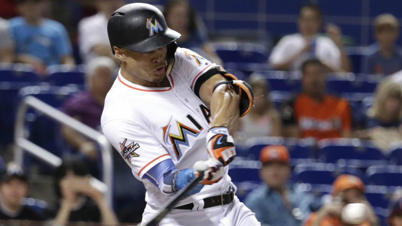 Miami-Marlins'-Giancarlo-Stanton-hits-a-single-during-the-first-inning-of-a-baseball-game-against-the-San-Francisco-Giants,-Tuesday,-Aug.-15,-2017,-in-Miami.-(Lynne-Sladky/AP)
