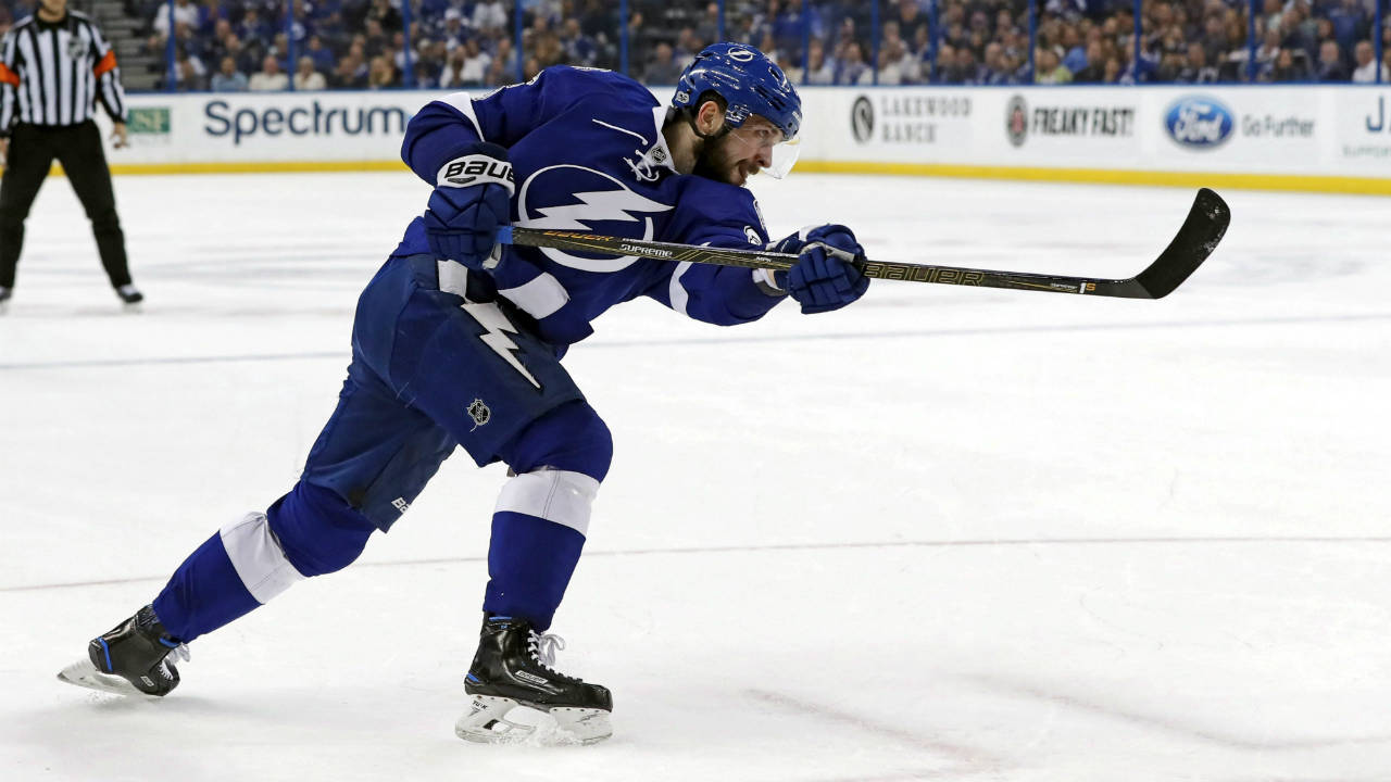 Tampa-Bay-Lightning's-Nikita-Kucherov,-of-Russia,-follows-through-on-a-shot-to-score-his-third-goal-of-the-second-period-of-an-NHL-hockey-game-against-the-Ottawa-Senators-on-Monday,-Feb.-27,-2017,-in-Tampa,-Fla.-(Mike-Carlson/AP)