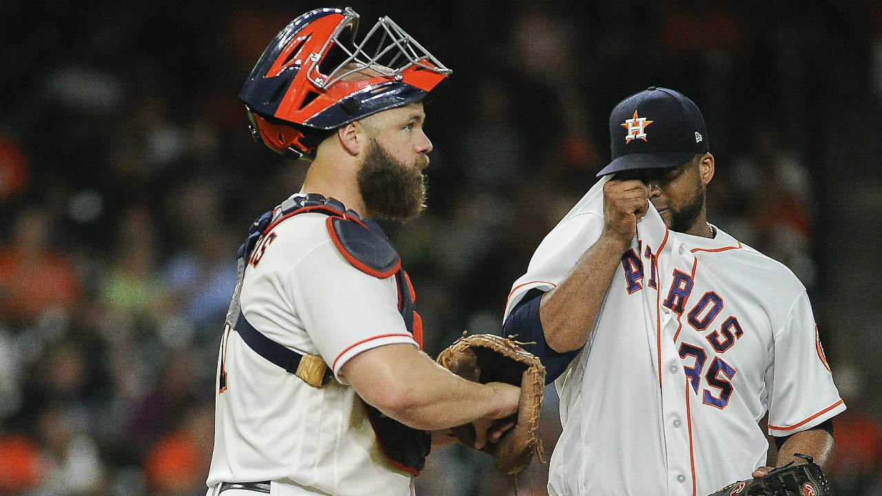 Houston-Astros'-relief-pitcher-Francisco-Liriano,-right,-is-relieved-by-manager-A.J.-Hinch,-left,-as-catcher-Evan-Gattis-waits-during-the-seventh-inning-of-a-baseball-game,-Thursday,-Aug.-3,-2017,-in-Houston.-(Eric-Christian-Smith/AP)