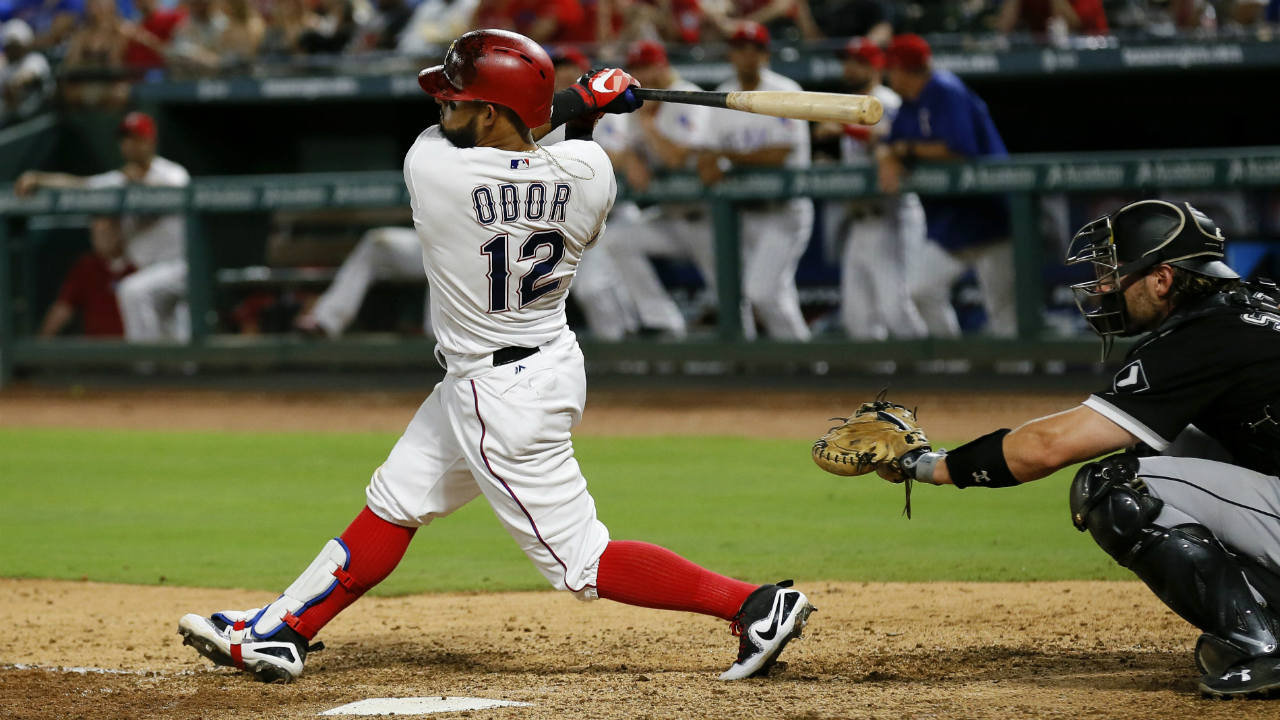 Texas Rangers' Rougned Odor follows through on a solo home run against the Chicago White Sox during the fourth inning of a baseball game, Saturday Aug. 19, 2017, in Arlington, Texas. (Roger Steinman/AP)