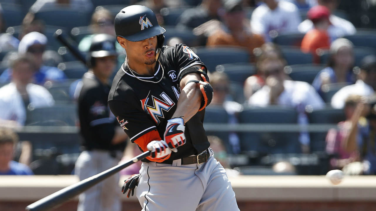 Miami-Marlins'-Giancarlo-Stanton-hits-a-three-run-home-run-against-the-New-York-Mets-during-the-seventh-inning-of-a-baseball-game,-Sunday,-Aug.-20,-2017,-in-New-York.-(Rich-Schultz/AP)