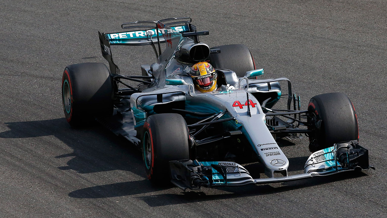 Britain-driver-Lewis-Hamilton-steers-his-Mercedes.-(Antonio-Calanni/AP)