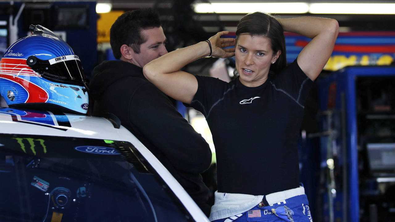 Danica-Patrick-gets-suited-up-as-she-prepares-to-practise-for-the-NASCAR-Cup-Series-300-auto-race-at-New-Hampshire-Motor-Speedway-in-Loudon,-N.H.,-Saturday,-Sept.-23,-2017.-(Charles-Krupa/AP)