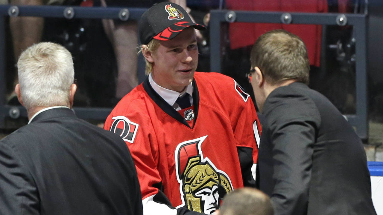 Filip-Chlapik-greets-team-executives-after-being-chosen-48th-overall-by-the-Ottawa-Senators-during-the-second-round-of-the-NHL-hockey-draft,-Saturday,-June-27,-2015,-in-Sunrise,-Fla.-(Alan-Diaz/AP)