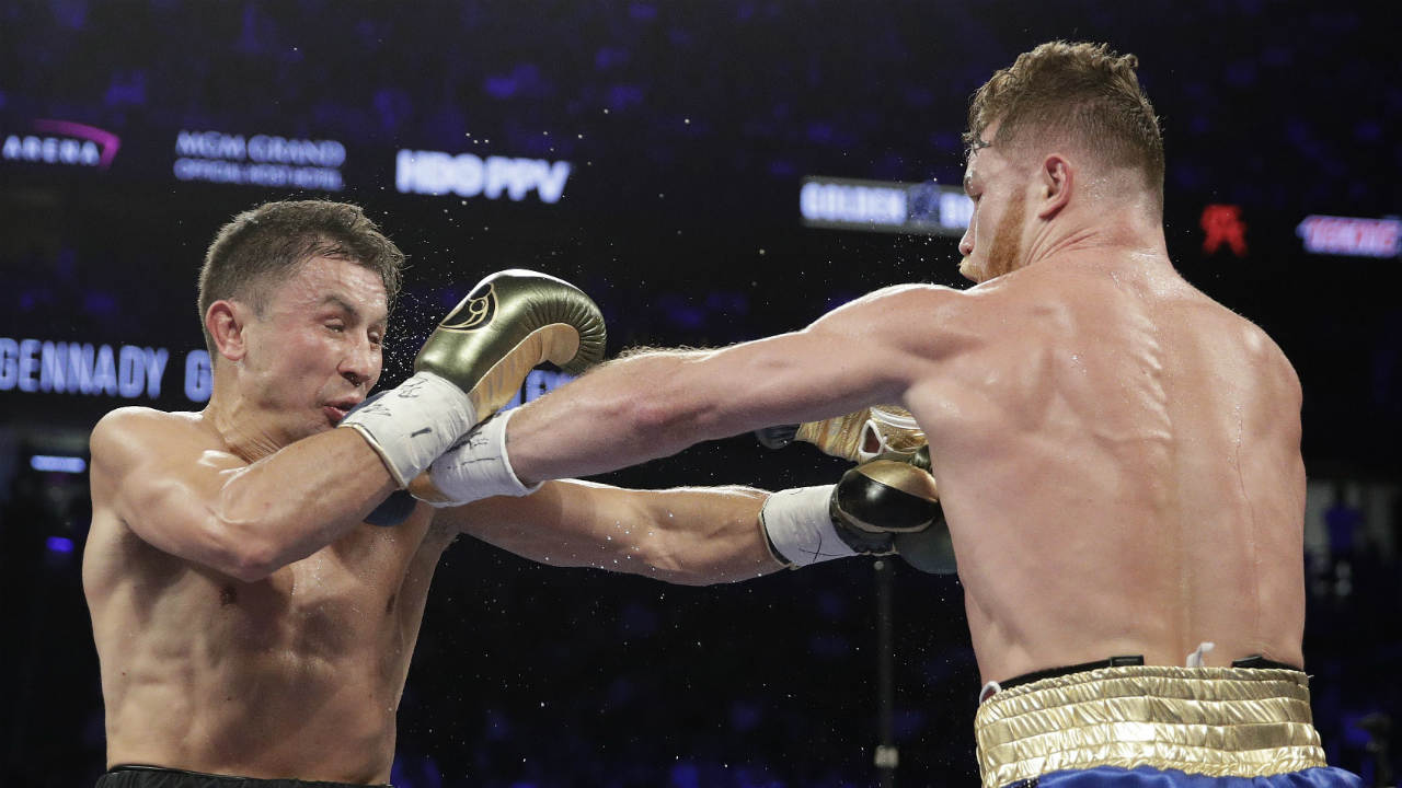 Canelo-Alvarez,-right,-fights-Gennady-Golovkin-during-a-middleweight-boxing-bout-Saturday,-Sept.-16,-2017,-in-Las-Vegas.-(John-Locher/AP)