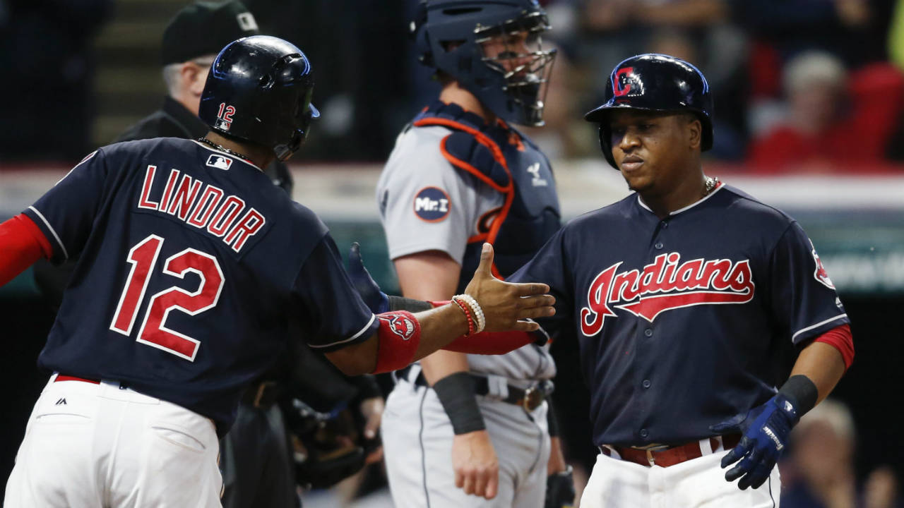 Cleveland-Indians'-Jose-Ramirez-gets-congratulations-from-Francisco-Lindor-(12)-after-hitting-a-two-run-home-run-off-Detroit-Tigers-starting-pitcher-Myles-Jaye-as-catcher-James-McCann-stands-in-the-background-during-the-fourth-inning-in-a-baseball-game,-Monday,-Sept.-11,-2017,-in-Cleveland.-(Ron-Schwane/AP)