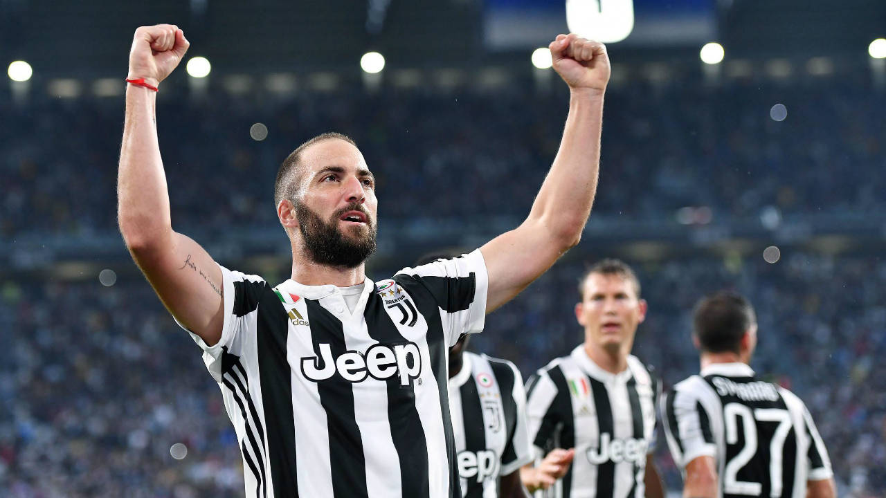Juventus's-Gonzalo-Higuain-celebrates-after-scoring-a-goal-during-the-Italian-Serie-A-Soccer-match-between-Juventus-and-Chievo-at-the-Allianz-Stadium-in-Turin,-Italy,-Saturday,-Sept.-9,-2017.-(Alessandro-Di-Marco/ANSA-via-AP)