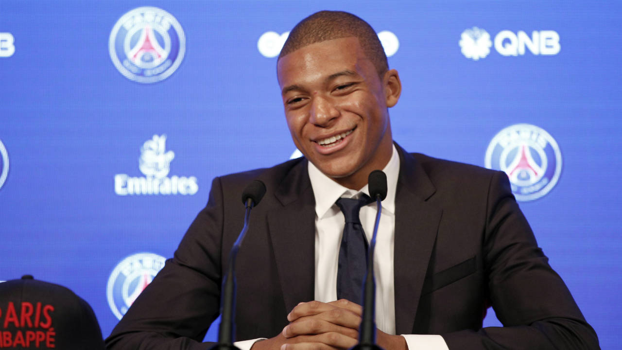 French-soccer-player-Kylian-Mbappe-attends-a-press-conference-in-Paris,-Wednesday,-Sept.-6,-2017.-Mbappe-is-a-young-man-in-a-big-hurry-and-wants-to-"win-everything"-with-his-new-club-Paris-Saint-Germain.-(Christophe-Ena/AP)