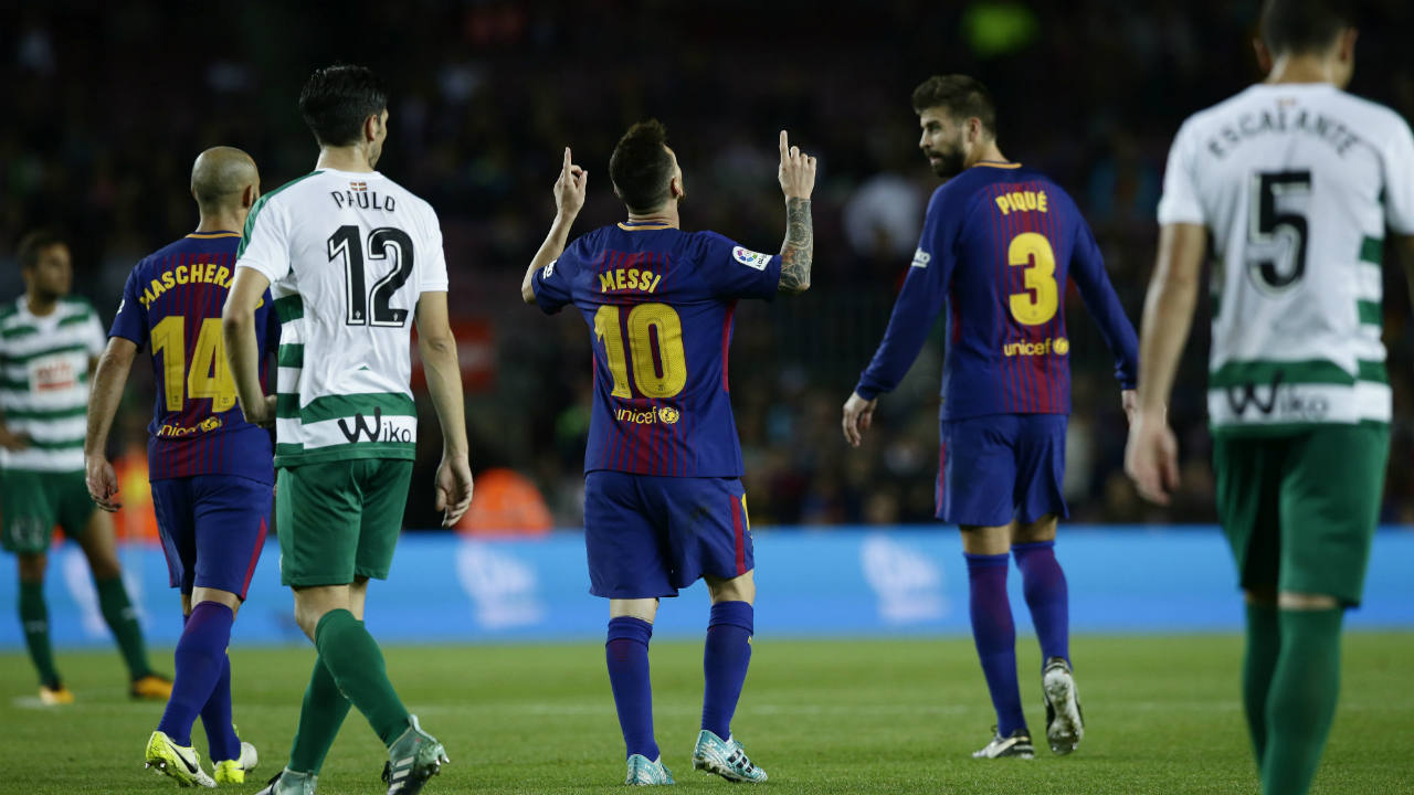 FC-Barcelona's-Lionel-Messi,-centre,-celebrates-after-scoring-with-his-teammate-Denis-Suarez-during-the-Spanish-La-Liga-soccer-match-between-FC-Barcelona-and-Eibar-at-the-Camp-Nou-stadium-in-Barcelona,-Spain,-Tuesday,-Sept.-19,-2017.-(Manu-Fernandez/AP)