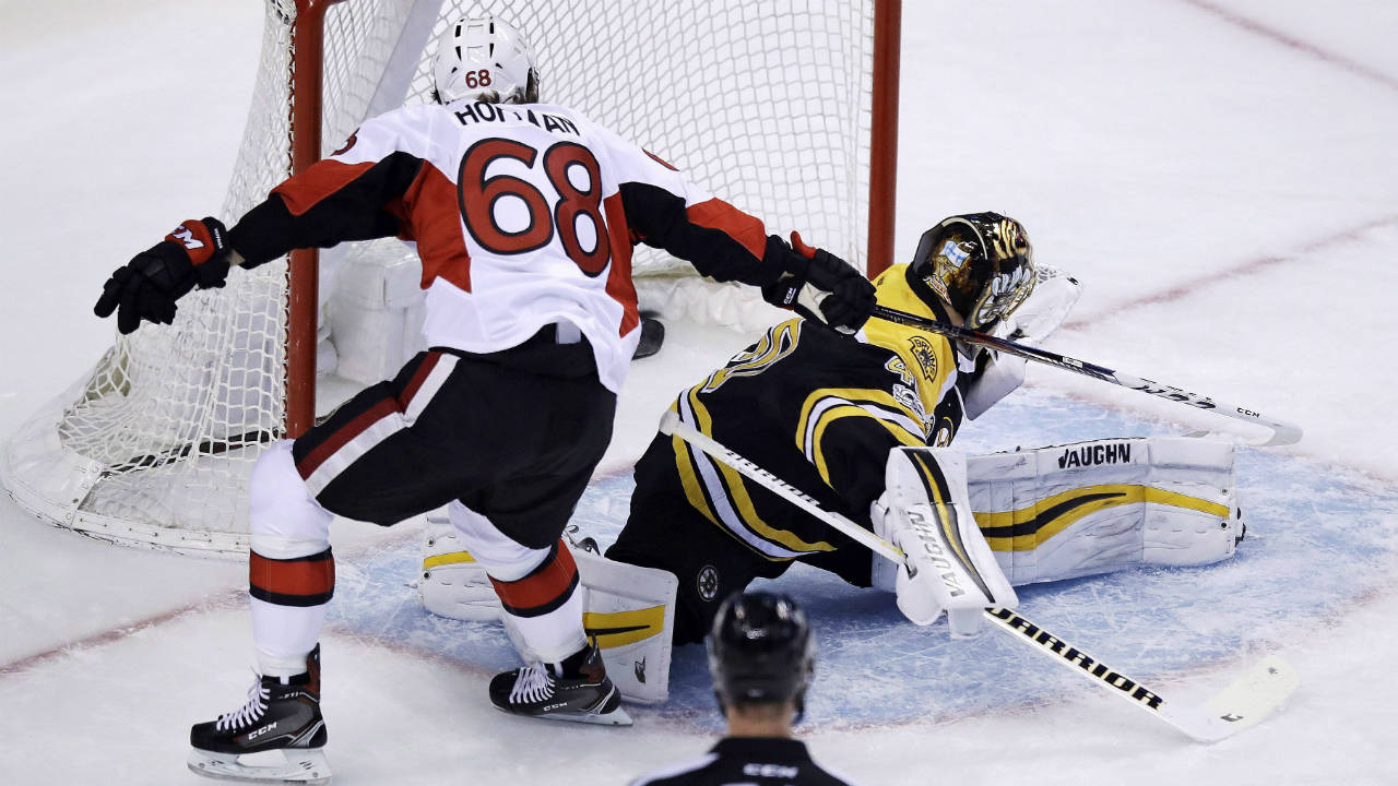 Ottawa-Senators-left-wing-Mike-Hoffman-(68)-tips-the-puck-past-Boston-Bruins-goalie-Tuukka-Rask-(40)-for-a-goal-as-he-skates-past-during-the-first-period-in-Game-3-of-a-first-round-NHL-hockey-playoff-series-in-Boston,-Monday,-April-17,-2017.-(Charles-Krupa/AP)