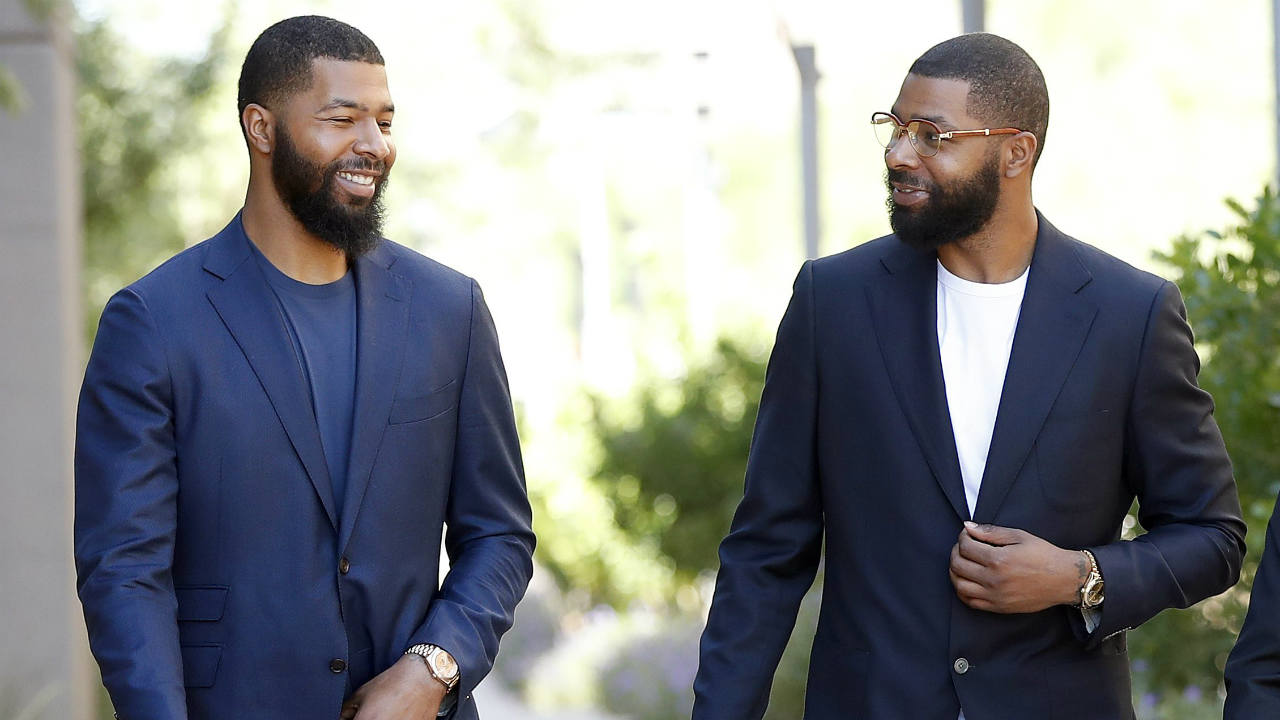 NBA-players-Markieff,-left,-and-Marcus-Morris-arrive-at-Superior-Court-for-the-second-day-of-their-aggravated-assault-trial,-Tuesday,-Sept.-19,-2017,-in-Phoenix.-The-twins,-along-with-Gerald-Bowman,-are-charged-with-assaulting-Erik-Hood-outside-a-recreation-center-in-2015-in-Phoenix.-(Matt-York/AP)