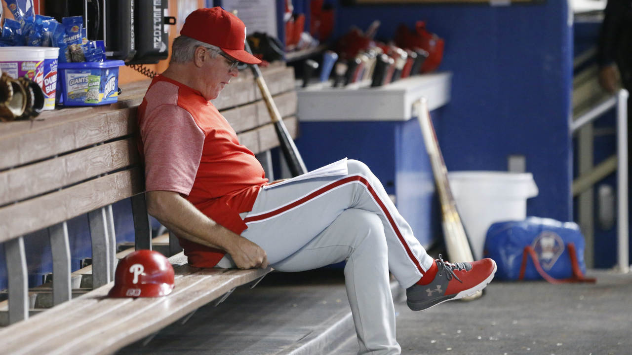In-this-Sept.-2,-2017,-file-photo,-Philadelphia-Phillies-manager-Pete-Mackanin-sits-in-the-dugout-before-the-start-of-a-baseball-game-against-the-Miami-Marlins-in-Miami.-The-Phillies-announced-Friday,-Sept.-29,-2017,-that-Mackanin-will-be-replaced-for-next-season.-(Wilfredo-Lee,-File/AP)