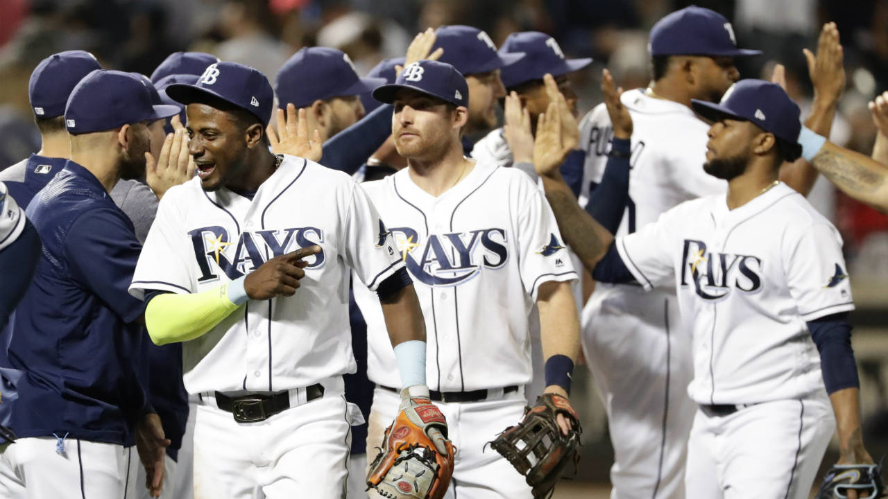 Tampa-Bay-Rays'-Adeiny-Hechavarria,-left,-celebrates-with-teammates-after-a-baseball-game-against-the-New-York-Yankees-on-Tuesday,-Sept.-12,-2017,-in-New-York.-The-Rays-won-2-1.-(Frank-Franklin-II/AP)