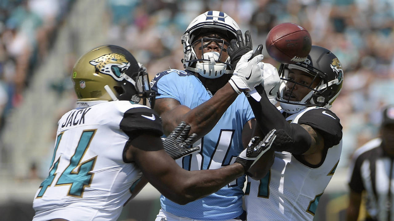 Jacksonville-Jaguars-outside-linebacker-Myles-Jack-(44)-and-cornerback-A.J.-Bouye,-right,-break-up-a-pass-intended-for-Tennessee-Titans-wide-receiver-Corey-Davis-during-the-first-half-of-an-NFL-football-game,-Sunday,-Sept.-17,-2017,-in-Jacksonville,-Fla.-(Phelan-M.-Ebenhack/AP)