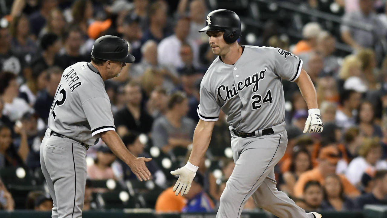 Chicago-White-Sox's-Matt-Davidson-(24)-is-congratulated-by-third-base-coach-Nick-Capra-(12)-after-hitting-a-home-run-against-the-Detroit-Tigers-in-the-fifth-inning-of-a-baseball-game,-Saturday,-Sept.-16,-2017,-in-Detroit.-(Jose-Juarez/AP)