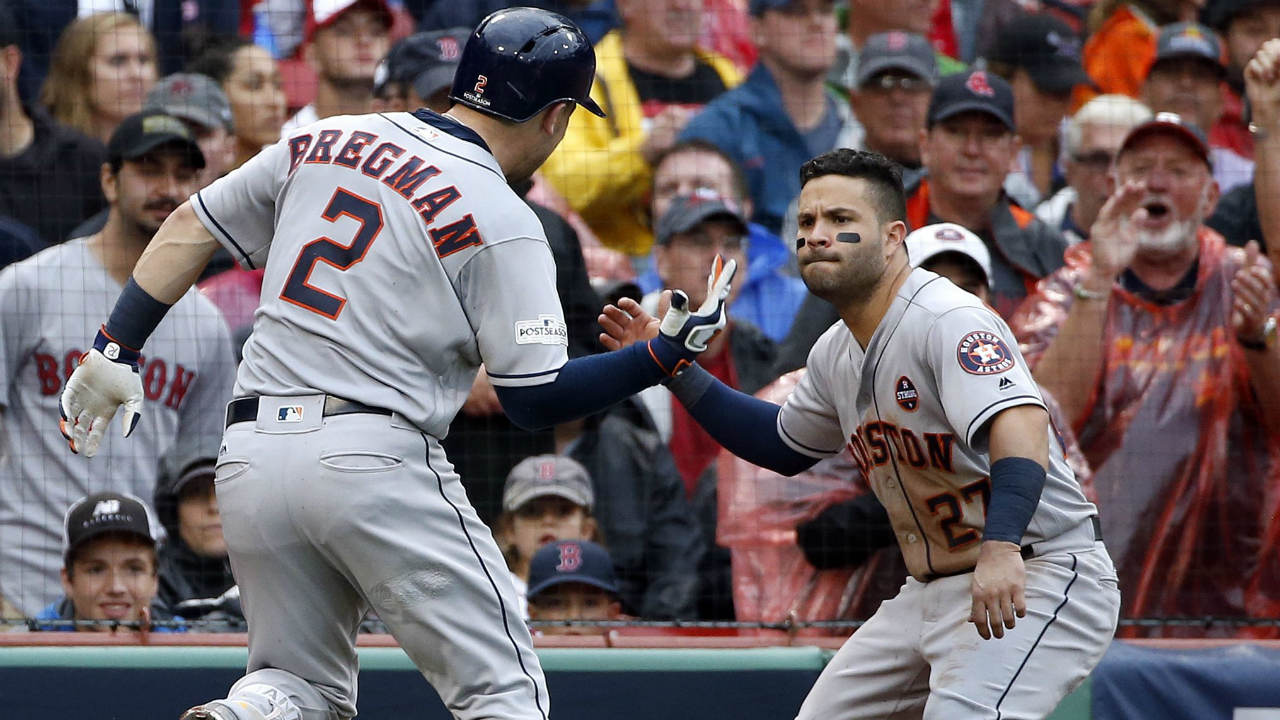 Houston-Astros'-Alex-Bregman-celebrates-his-home-run-off-Boston-Red-Sox-relief-pitcher-Chris-Sale-with-Jose-Altuve,-right,-during-the-eighth-inning-of-Game-4-in-baseball's-American-League-Division-Series,-Monday,-Oct.-9,-2017,-in-Boston.-(Michael-Dwyer/AP)
