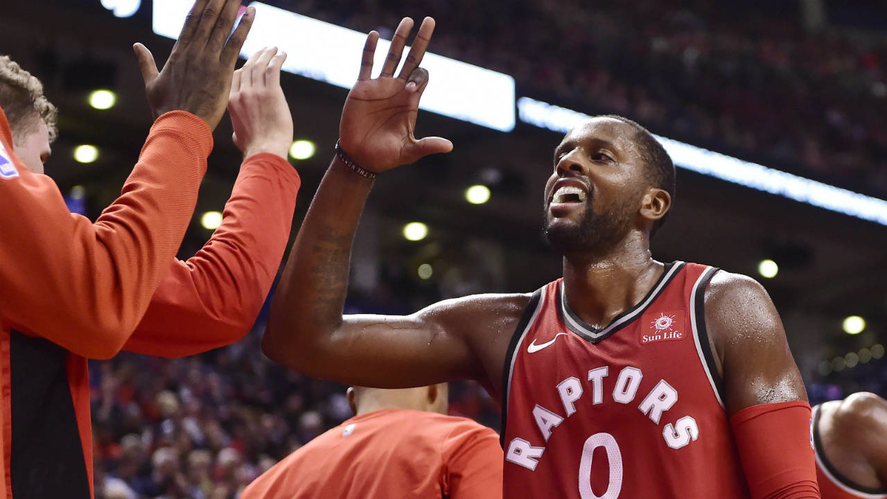 Toronto-Raptors-forward-CJ-Miles-(0)-is-congratulated-by-teammates-on-the-bench-during-second-half-NBA-basketball-action-against-the-Chicago-Bulls-in-Toronto-on-Thursday,-October-19,-2017.-(Frank-Gunn/CP)