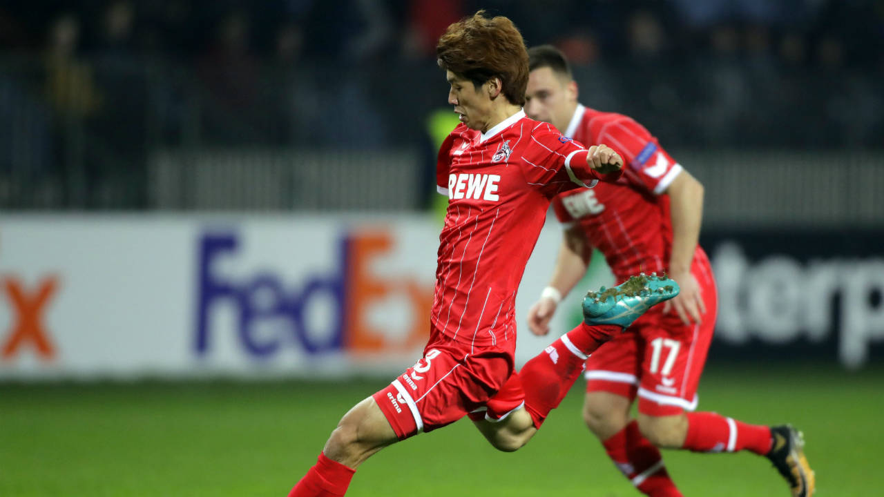Cologne's-Yuya-Osako-attempts-a-shot-at-goal.-(Sergei-Grits/AP)