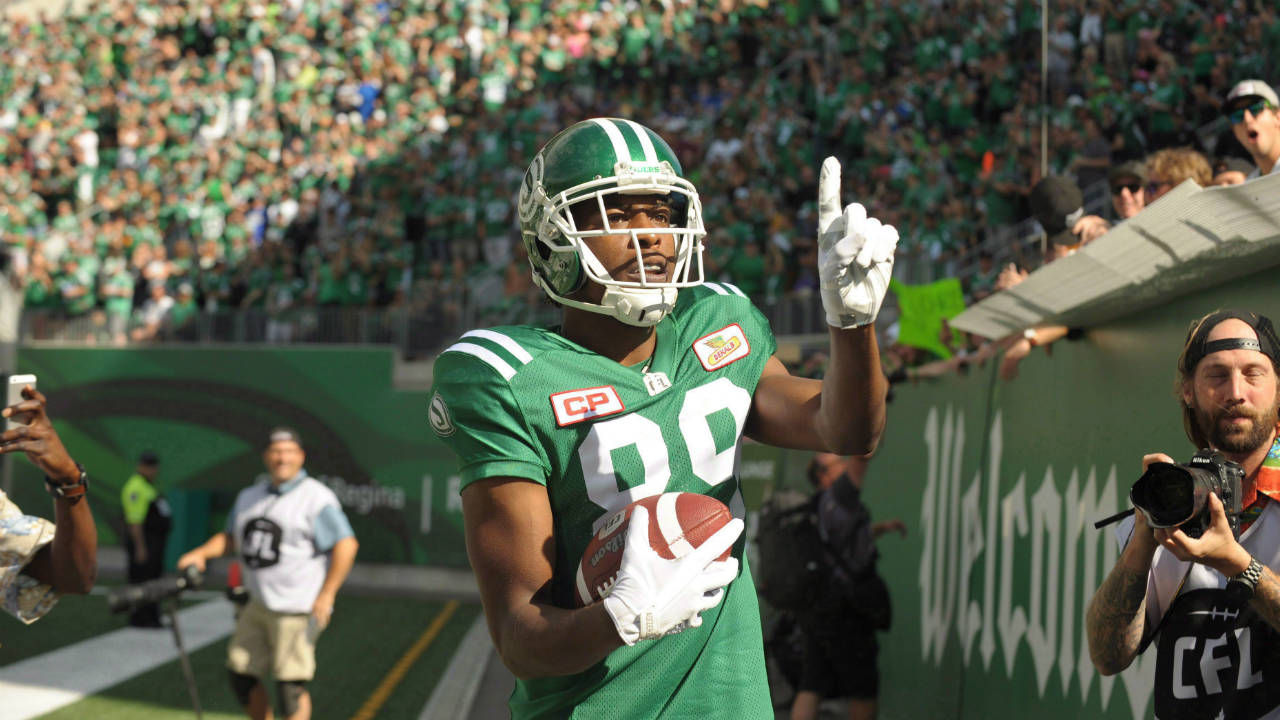 Saskatchewan-Roughriders-wide-receiver-Duron-Carter-celebrates-a-touchdown-by-taunting-Winnipeg-Blue-Bombers-fans-during-first-half-CFL-action-in-Regina-on-Sunday,-September-3,-2017.-Roughriders-head-coach-and-general-manager-Chris-Jones-was-expected-to-speak-to-reporters-Tuesday-after-reports-that-star-receiver-Duron-Carter-and-defensive-back-Sam-Williams-had-an-altercation-during-Monday's-practice.-(Mark-Taylor/CP)