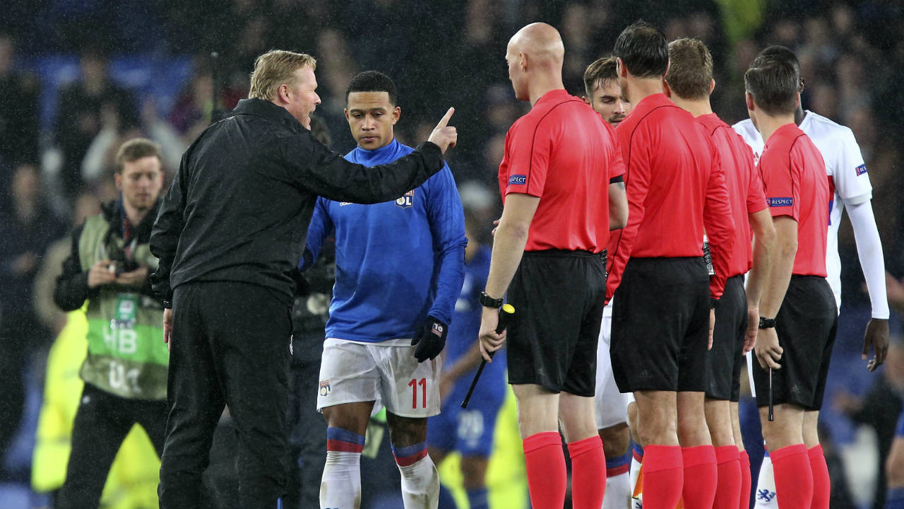 Everton's-manager-Ronald-Koeman-complains-to-referee-Bas-Nijhuis-after-a-Group-E-Europa-League-soccer-match-between-Everton-F.C.-and-Olympique-Lyon-at-Goodison-Park-Stadium,-Liverpool,-England,-Thursday-Oct.-19,-2017.-(Dave-Thompson/AP)