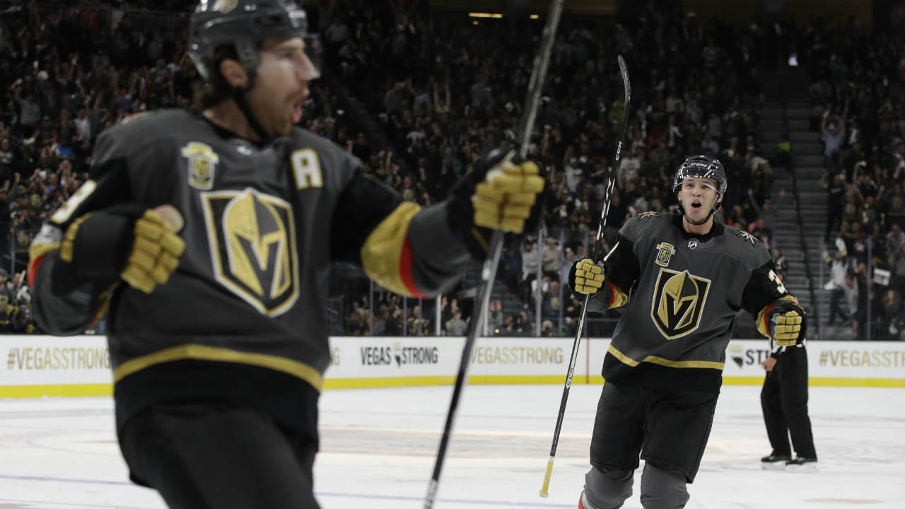 Vegas-Golden-Knights-defenceman-Brayden-McNabb,-right,-celebrates-after-teammate-left-wing-James-Neal,-left,-scored-during-the-first-period-of-an-NHL-hockey-game-Tuesday,-Oct.-10,-2017,-in-Las-Vegas.-(John-Locher/AP)