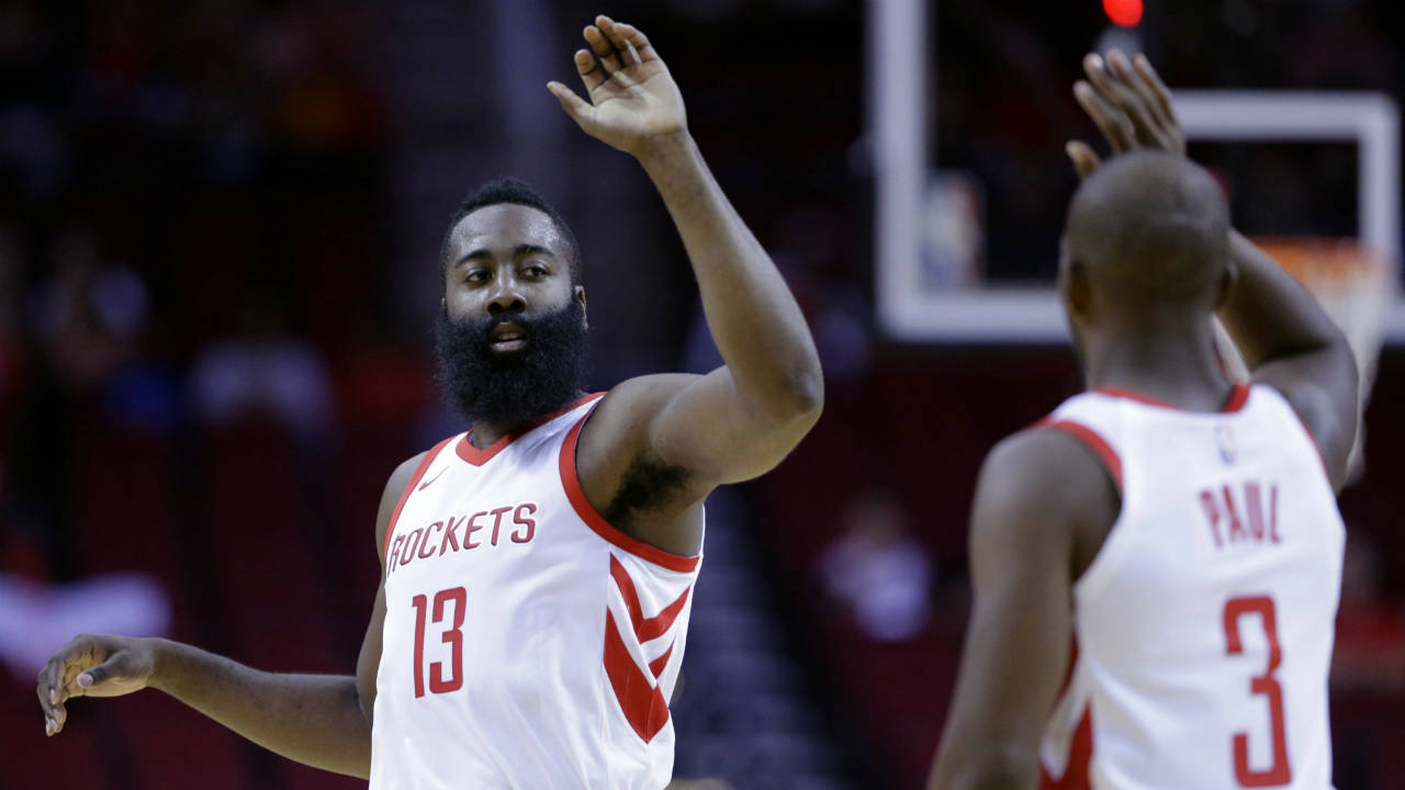 Houston-Rockets-guard-James-Harden-(13)-and-Chris-Paul-(3-)high-five-in-the-first-half-of-an-NBA-exhibition-basketball-game-against-the-Shanghai-Sharks-Thursday,-Oct.-5,-2017,-in-Houston.-(Michael-Wyke/AP)