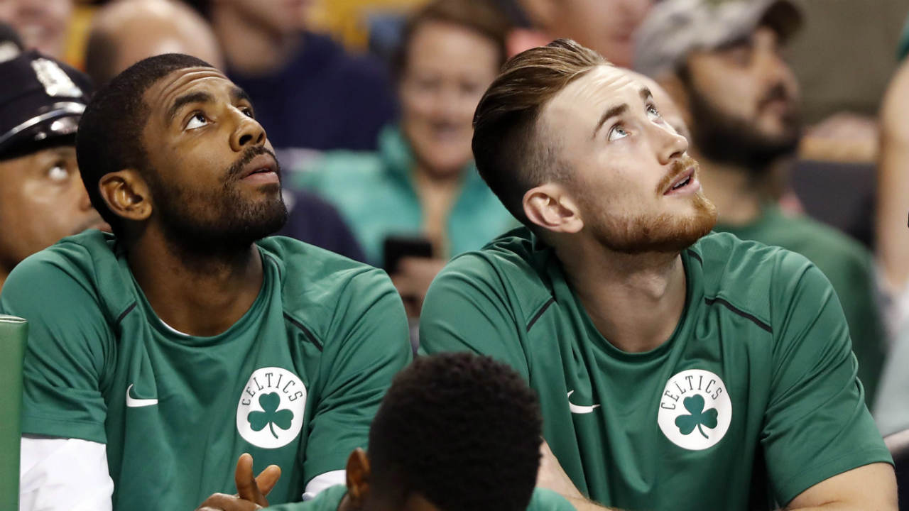 Boston-Celtics'-Kyrie-Irving,-left,-and-Gordon-Hayward-look-on-from-the-bench-during-the-first-quarter-of-a-preseason-NBA-basketball-game-against-the-Philadelphia-76ers-in-Boston,-Monday,-Oct.-9,-2017.-(Winslow-Townson/AP)