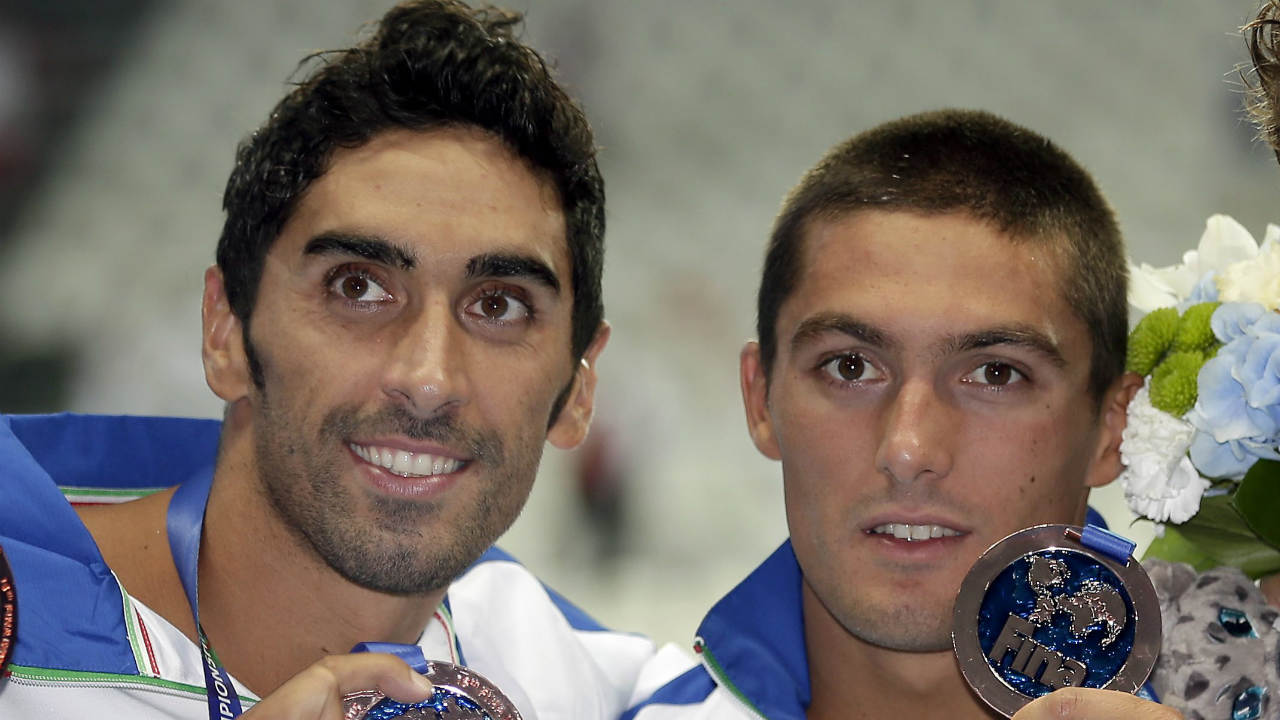 In-this-Sunday,-Aug.-2,-2015,-men's-4x100m-freestyle-relay-team-Italy's-Filippo-Magnini,-left,-and-Michele-Santucci-hold-up-their-bronze-medals-at-the-Swimming-World-Championships-in-Kazan,-Russia.-Two-time-swimming-world-champion-Filippo-Magnini-and-sprint-relay-teammate-Michele-Santucci-are-being-questioned-by-Italian-anti-doping-authorities-over-their-relationship-with-a-nutritionist-being-investigated-for-alleged-illegal-drugs-distribution.-(Michael-Sohn,-File/AP)