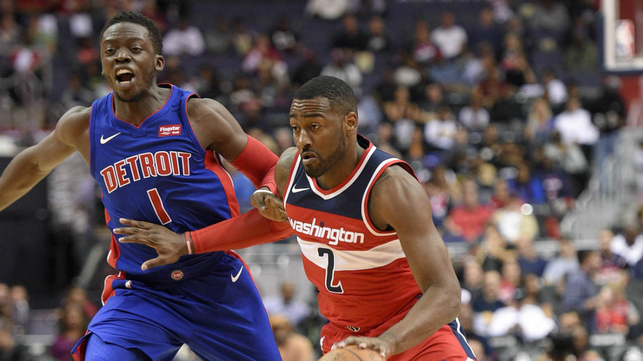 Washington-Wizards-guard-John-Wall-(2)-dribbles-past-Detroit-Pistons-guard-Reggie-Jackson-(1)-during-the-second-half-of-an-NBA-basketball-game,-Friday,-Oct.-20,-2017,-in-Washington.-The-Wizards-won-115-111.(Nick-Wass/AP)