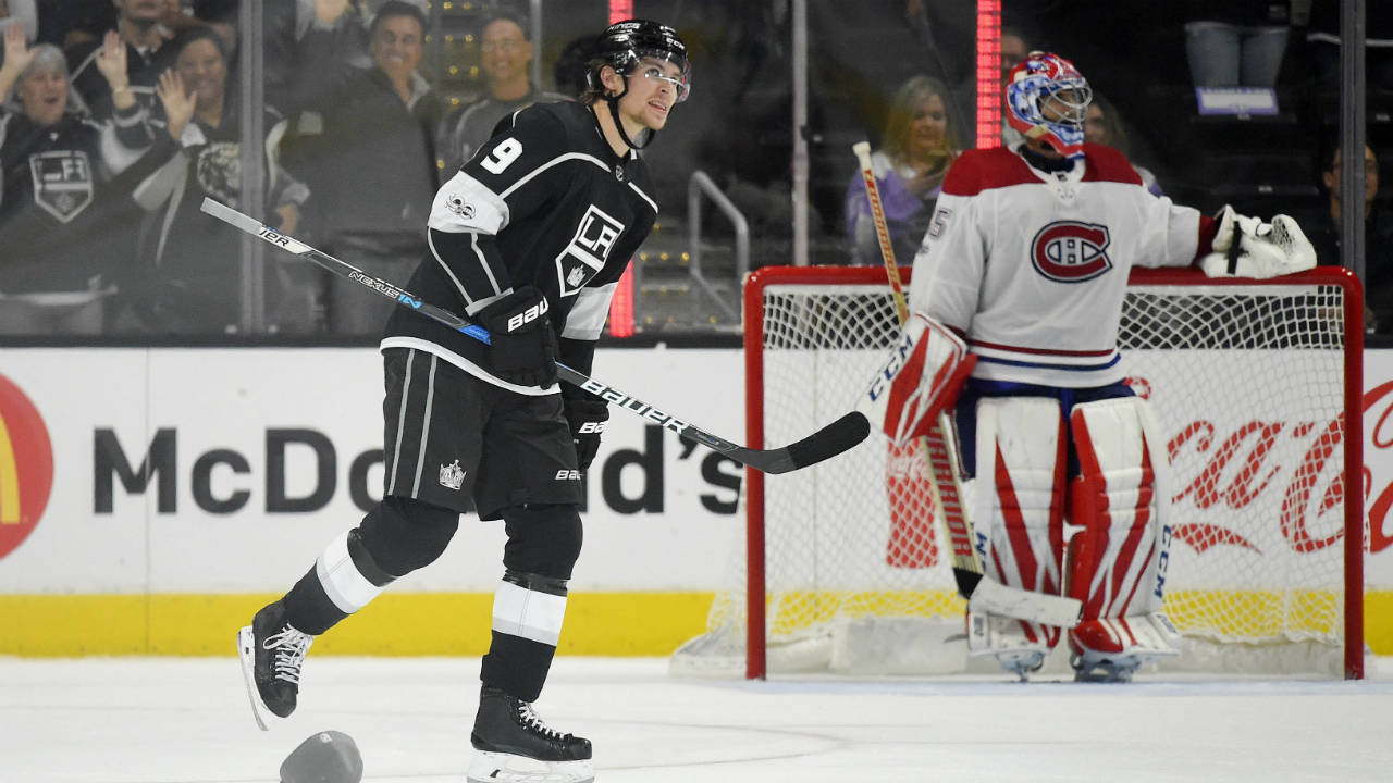 Los-Angeles-Kings-left-wing-Adrian-Kempe,-left,-of-Sweden,-skates-to-his-bench-while-hats-rain-down-on-the-ice-after-scoring-his-third-goal-of-the-game-as-Montreal-Canadiens-goalie-Al-Montoya-watches-during-the-third-period-of-an-NHL-hockey-game,-Wednesday,-Oct.-18,-2017,-in-Los-Angeles.-The-Kings-won-5-1.-(Mark-J.-Terrill/AP)