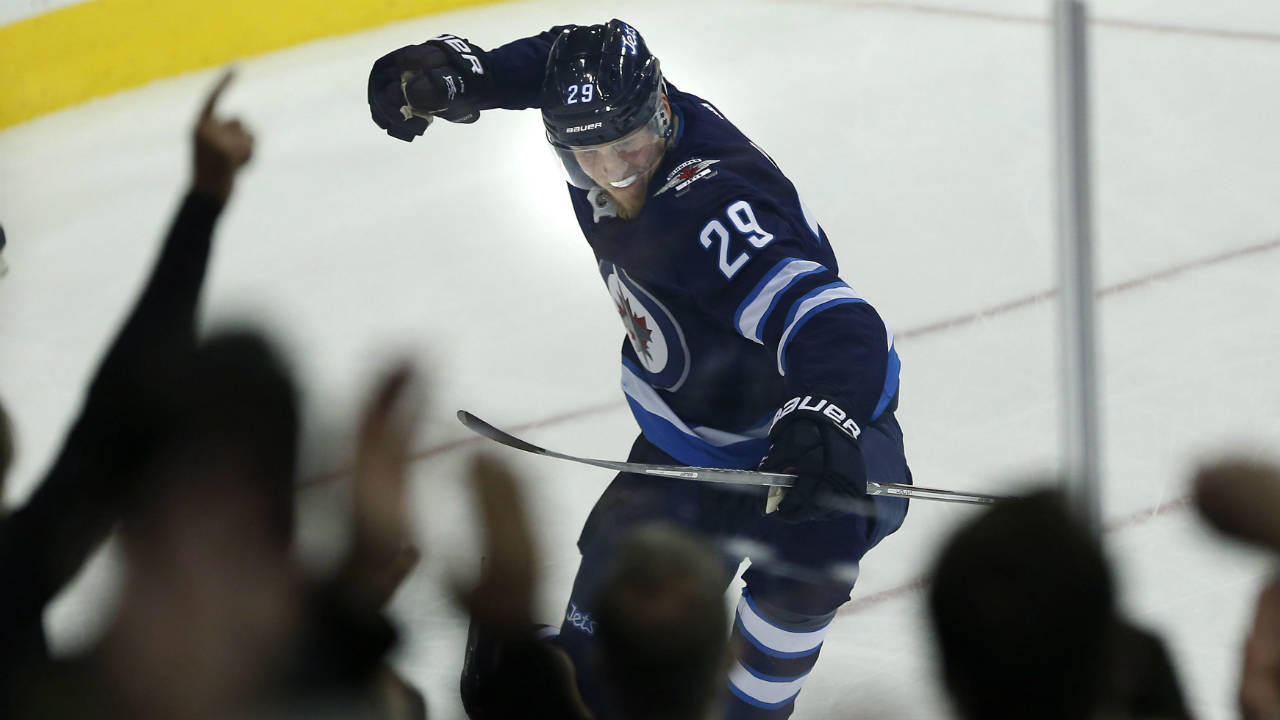 Winnipeg-Jets'-Patrik-Laine-(29)-celebrates-his-goal-against-the-Minnesota-Wild-during-first-period-NHL-action-in-Winnipeg-on-Friday,-October-20,-2017.-(John-Woods/CP)