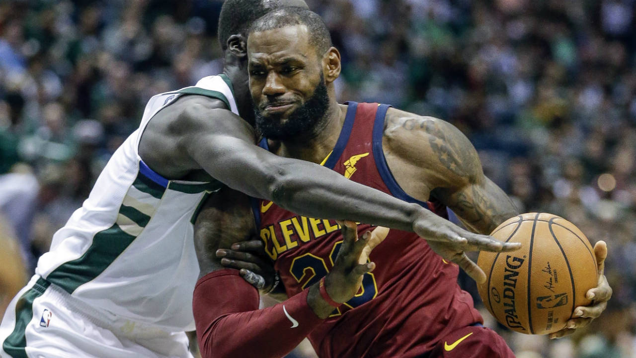 Milwaukee-Bucks'-Thon-Maker,-left,-reaches-in-on-Cleveland-Cavaliers'-LeBron-James-during-the-first-half-of-an-NBA-basketball-game-Friday,-Oct.-20,-2017,-in-Milwaukee.-(Tom-Lynn/AP)