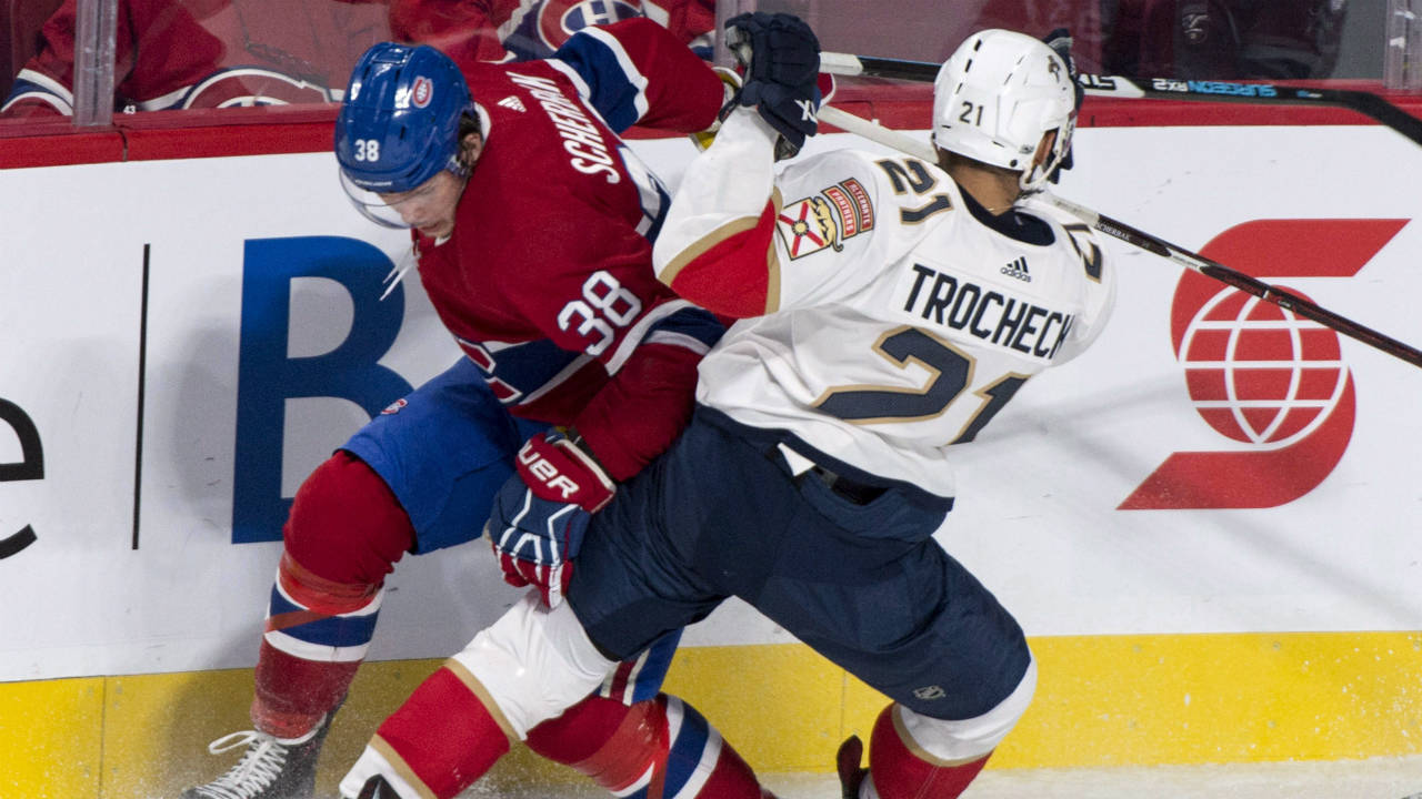 Montreal-Canadiens-left-wing-Nikita-Scherbak-(38)-tries-to-break-away-from-Florida-Panthers-centre-Vincent-Trocheck-(21)-during-first-period-NHL-pre-season-hockey-action-Friday,-September-29,-2017-in-Montreal.-(Paul-Chiasson/CP)