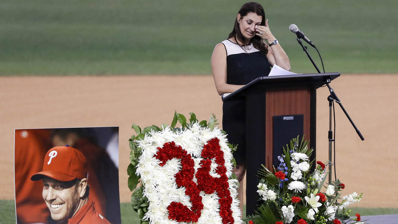 Brandy-Halladay,-wife-of-late-pitcher-Roy-Halladay,-wipes-her-eyes-while-talking-about-her-husband-during-an-event-honoring-his-life,-at-Spectrum-Field-in-Clearwater,-Fla.,-Tuesday,-Nov.-14,-2017.-Halladay,-a-two-time-Cy-Young-Award-winner,-died-Nov.-7-at-age-40-when-the-private-plane-he-was-piloting-crashed-into-the-Gulf-of-Mexico-off-the-coast-of-Florida.-(Yong-Kim/The-Philadelphia-Inquirer-via-AP)