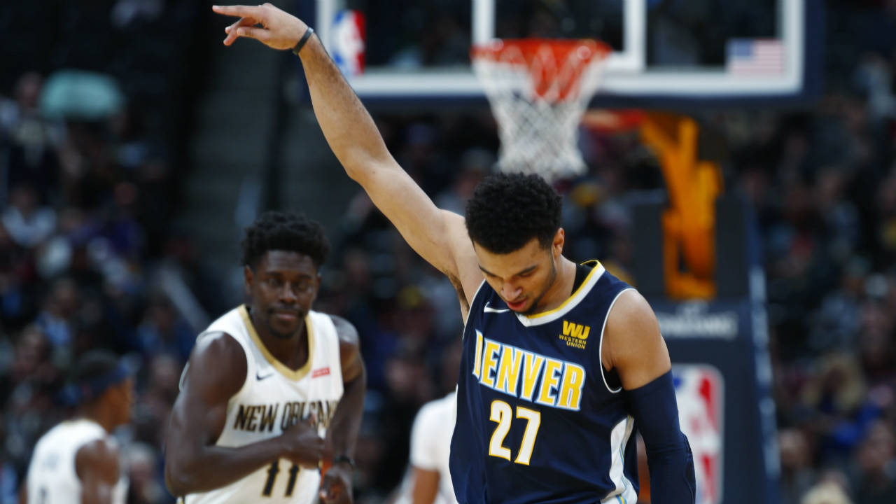 Denver-Nuggets-guard-Jamal-Murray-reacts-after-hitting-a-three-point-basket-over-New-Orleans-Pelicans-guard-Jrue-Holiday-in-the-first-half-of-an-NBA-basketball-game-Friday,-Nov.-17,-2017,-in-Denver.-(David-Zalubowski/AP)
