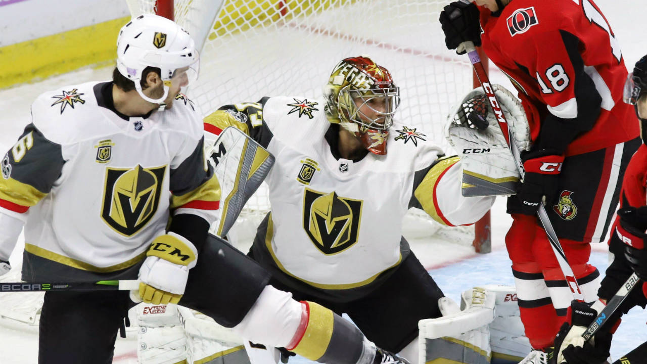 Vegas-Golden-Knights-goalie-Maxime-Lagace-(33)-makes-a-glove-save-as-defenceman-Colin-Miller-(6)-and-Ottawa-Senators-left-wing-Ryan-Dzingel-(18)-look-on-during-first-period-NHL-hockey-action-in-Ottawa-on-Saturday,-Nov.-4,-2017.-(Fred-Chartrand/CP)