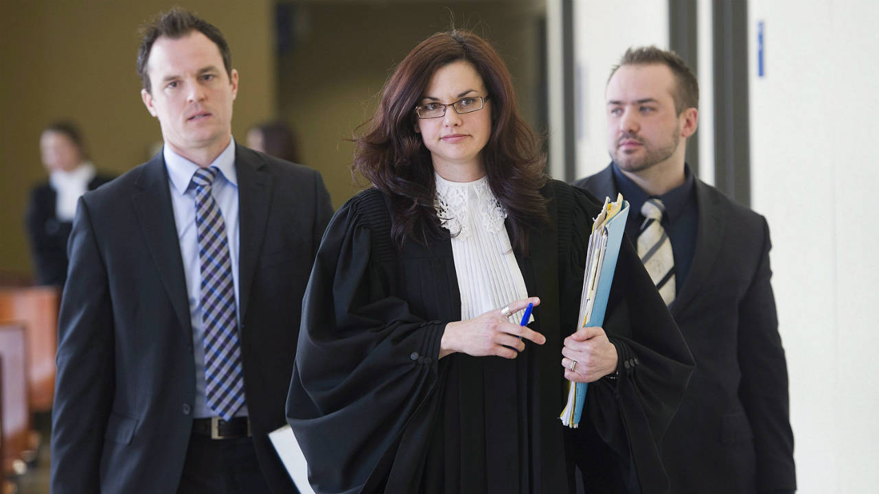 Crown-prosecutor-Aryanne-Guerin,-centre,-leaves-the-courthouse-in-Saint-Jerome,-Que.,-Friday,-March-20,-2015,-after-a-judge-denied-bail-to-former-ski-coach-Bertrand-Charest.-(Graham-Hughes/CP)