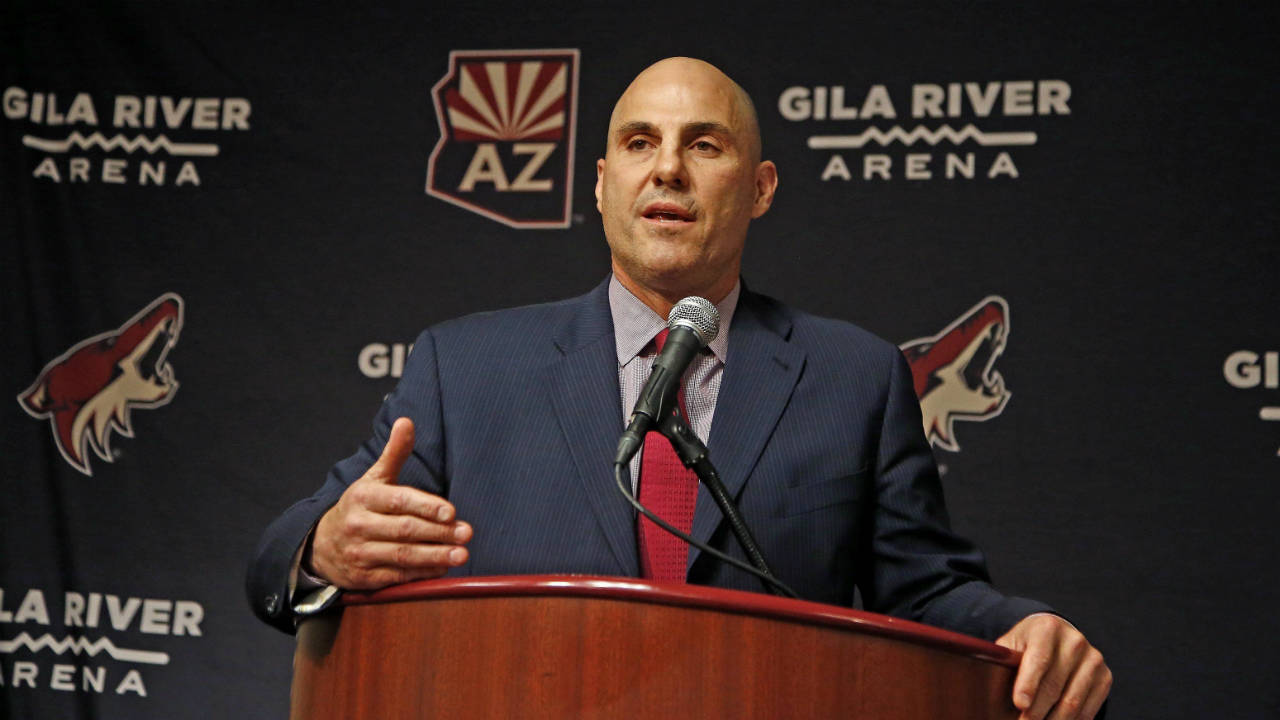 In-this-July-13,-2017,-file-photo,-Rick-Tocchet,-the-new-coach-of-the-Arizona-Coyotes,-speaks-during-a-news-conference-in-Glendale,-Ariz.-Tocchet-will-get-his-third-Pittsburgh-Penguins-Stanley-Cup-ring,-second-as-an-assistant-coach-after-one-as-a-player,-when-he-visits-as-coach-of-the-Arizona-Coyotes-on-Tuesday-night,-Nov.-7,-2017.-(Ross-D.-Franklin,-File/AP)