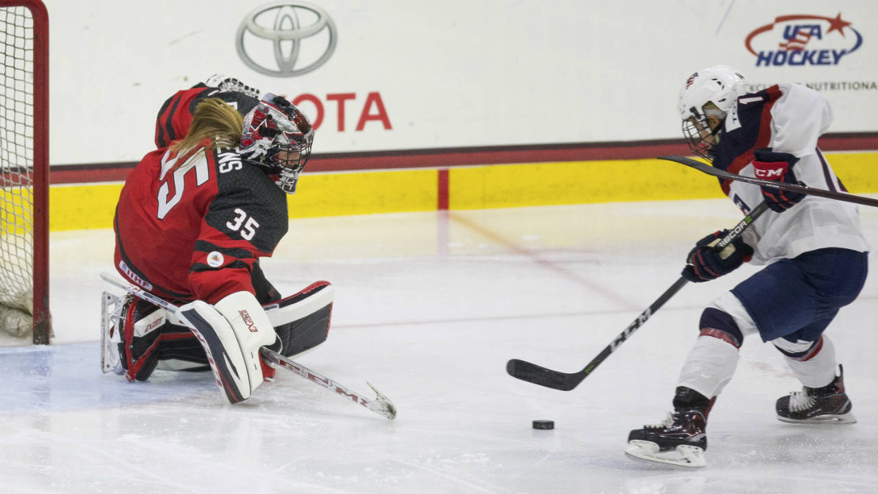 Canada-goaltender-Ann-Renee-Desbiens-(35)-makes-a-save-on-a-shot-by-the-United-States'-Brianna-Decker.-(Loren-Elliott/Tampa-Bay-Times-via-AP)