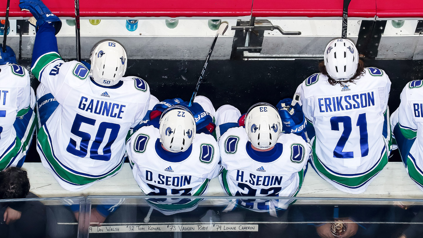 Sedins close amazing career with family on the bench 