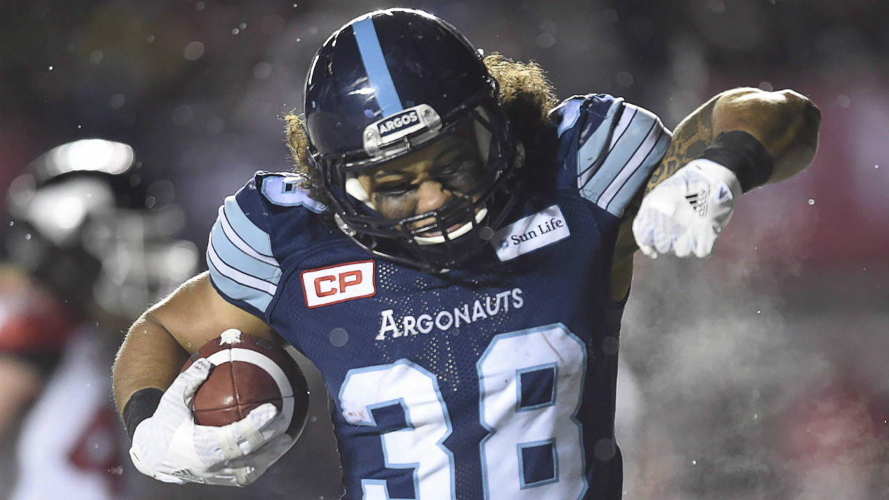 Toronto-Argonauts-fullback-Declan-Cross-(38)-celebrates-his-touchdown-against-the-Calgary-Stampeders-during-second-half-CFL-football-action-in-the-105th-Grey-Cup-Sunday-November-26,-2017-in-Ottawa.-(Nathan-Denette/CP)