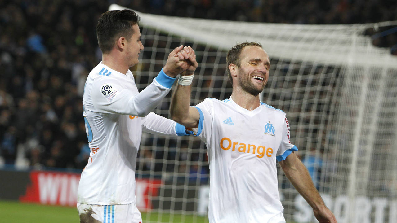 Marseille's-Valere-Germain,-right,-celebrates-with-Marseille's-Florian-Thauvin,-after-scoring-his-second-goal-during-the-League-One-soccer-match-between-Marseille-and-Saint-Etienne,-at-the-Velodrome-stadium,-in-Marseille,-southern-France,-Sunday,-Dec.-10,-2017.-(Claude-Paris/AP)
