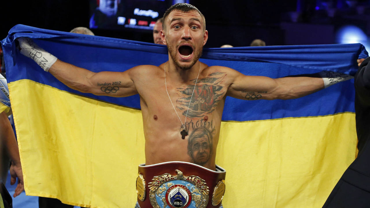Vasyl-Lomachenko,-of-Ukraine,-celebrates-after-defeating-Guillermo-Rigondeaux-during-a-WBO-junior-lightweight-title-boxing-match-Saturday,-Dec.-9,-2017,-in-New-York.-(Adam-Hunger/AP)